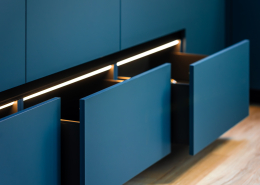 Light rail. Open drawers. Blue fronts